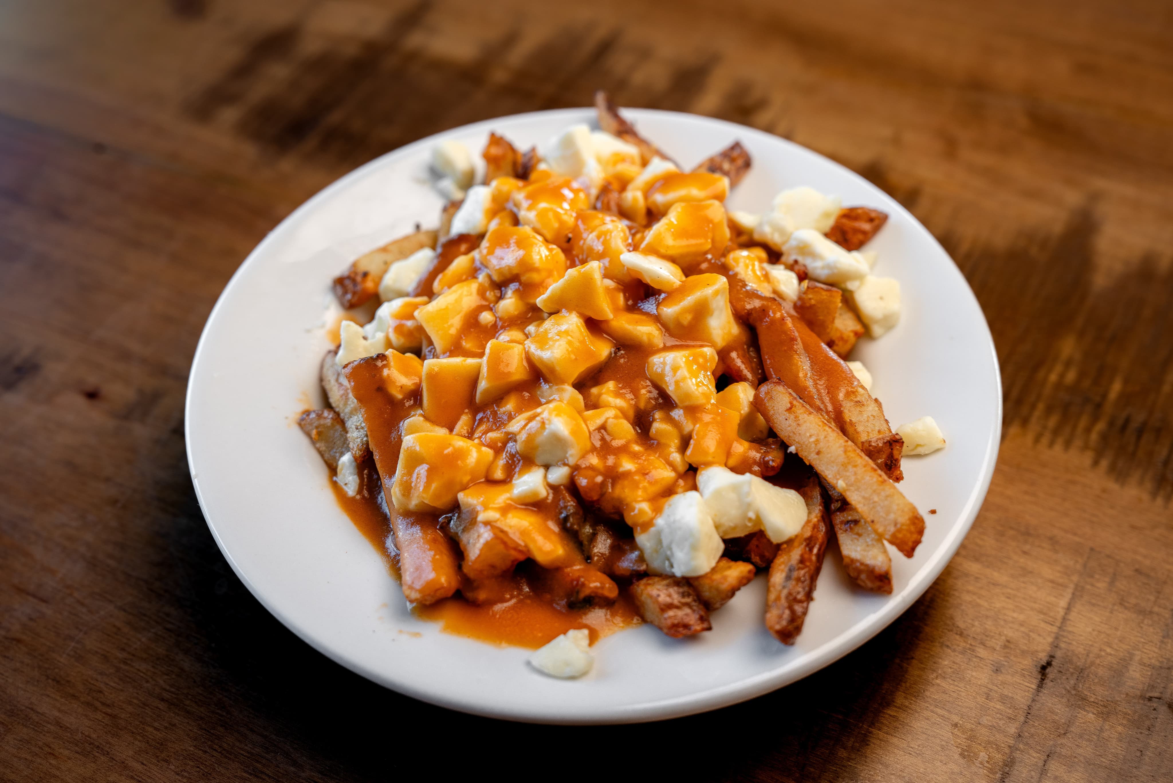 POUTINES GOURMANDES & FRITES Entrées, menu, plats savoureux, desserts, restaurant Moe’s